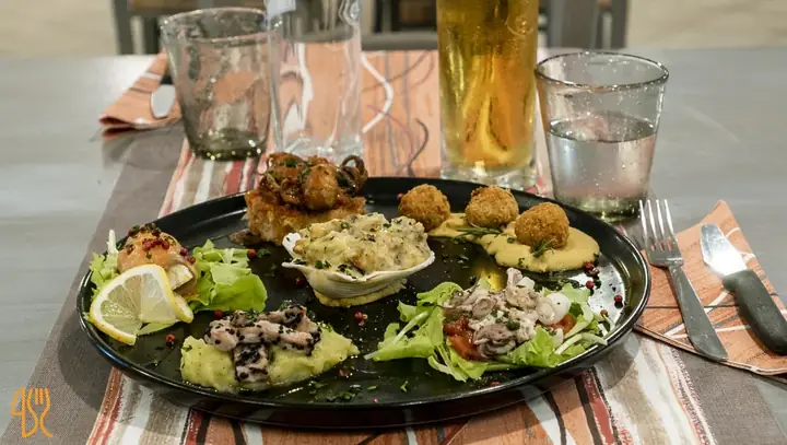 Antipasto misto di mare con polpo cozze olive all'ascolana e crostini La Fenice Bazzano